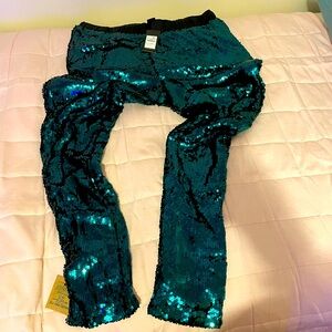 New with tags and never worn. Can fit a 16 or 18 has stretch.